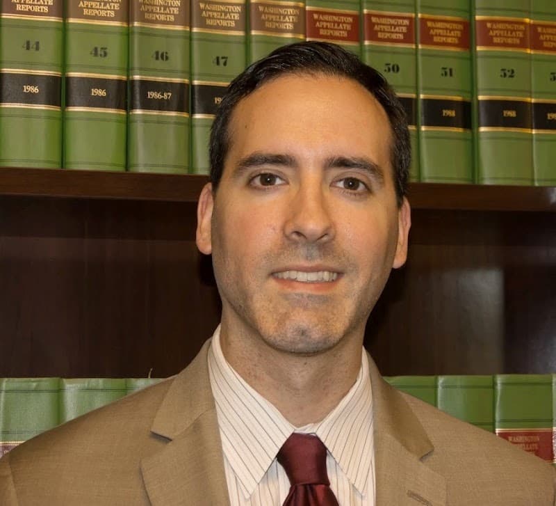 Conom Law Firm, Derek Conom